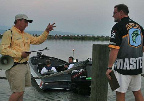 <p>
	Hank Weldon and Max Leatherwood go over final details as they prepare to send out the 36 boats of college anglers.</p>
