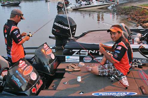 <p>
	The Oklahoma State team of Blake Flurry and Zach Birge adjust their gear.</p>
