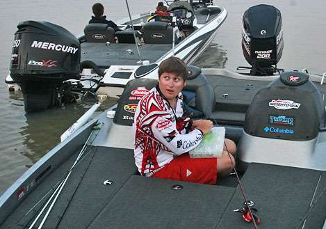 <p>
	Arkansas angler Mook Miller gets out his tackle while answering a question.</p>
