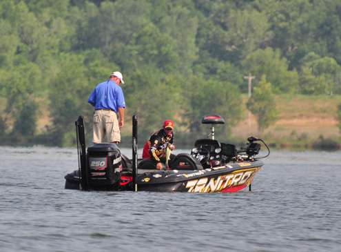 <p>
	VanDam moves back to the livewell with a nice largemouth as his Marshal looks on.</p>
