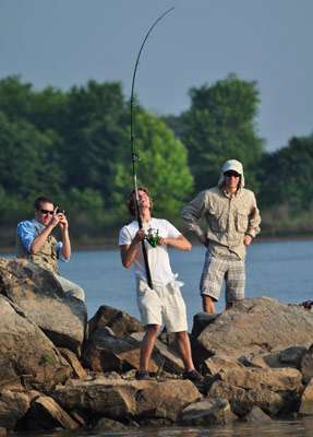 <p> 	This angler wrestled a catfish as Alton Jones worked a tube nearby.</p> 