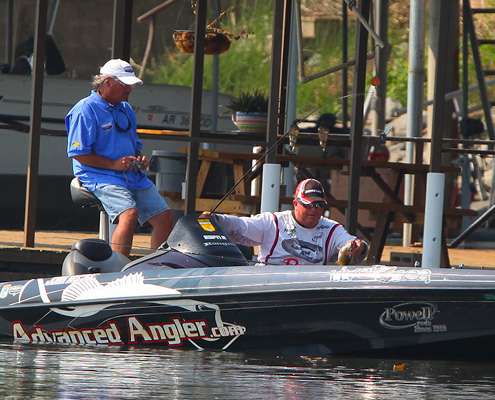 <p>
	While most spectators were watching Brauer and VanDam, John Murray was boating fish from a nearby boat dock. </p>
