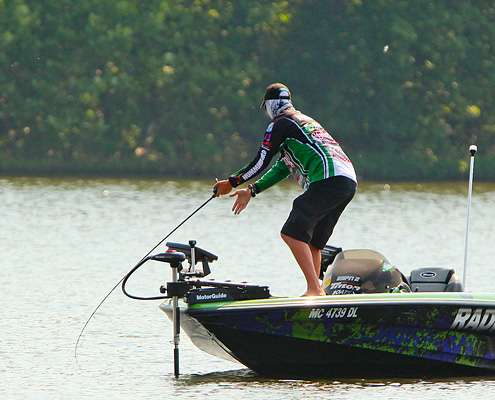 <p>
	VanDam hooks up with his first bass of the day. </p>
