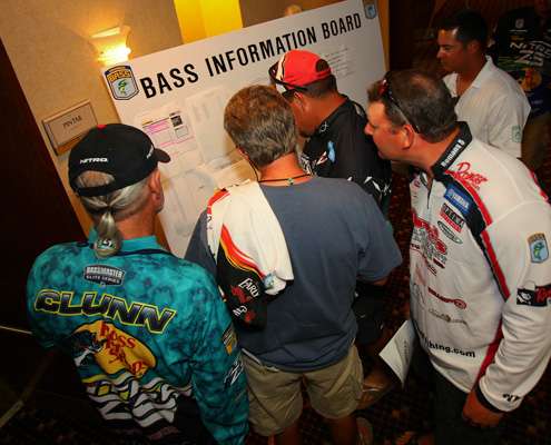 <p>
	Anglers check out the latest announcements and points standings.</p>
