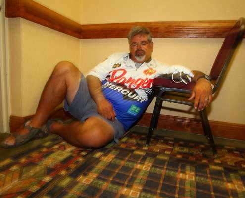 <p> 	Peter Thliveros found a quite corner to catch a quick nap before the anglers briefing</p> 