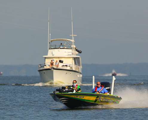 <p>
	J. Todd Tucker speeds around a large recreational boat on his way to another waypoint. </p>
