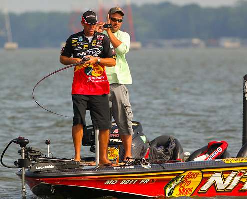 <p>
	Kevin VanDam hooks up as Mark Zona records the action with for a BASSCam video.</p>
