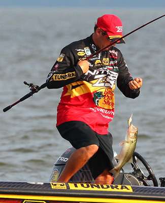 <p>
	 </p>
<p>
	VanDam boats yet another bass on the crankbait. </p>
