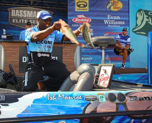 Ish Monroe pulls two of the fish from the live well that would help him bump Russ Lane from the lead.
