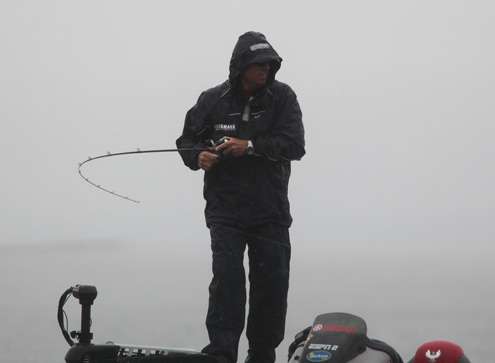 <p>
	Russ Lane sets the hook on what feels like a good fish.</p>
