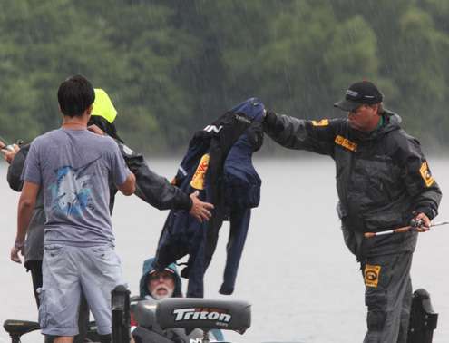 <p>
	Timmy Horton loaned an extra rain suit to Kevin Wirthâs Marshal who was getting soaked.</p>
