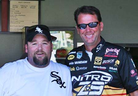 <p>
	 </p>
<p>
	Kevin VanDam poses with Charlie Cadie of Sherwood, Ark., who brought his White Sox little league team down to meet the Travelers players.</p>
