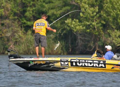 <p>
	Terry Scroggins quickly boats a short fish on Day One of the Diamond Drive.</p>
