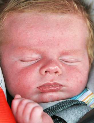 <p>
	 </p>
<p>
	Callen McCaghren, who will be one-month old Saturday, sleeps through the loud noise and music at the weigh-in.</p>
