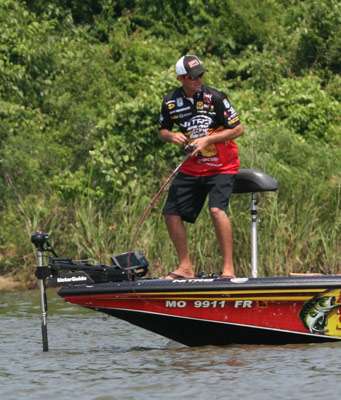 <p>
	Kevin VanDam hooks up with his best fish of the day.</p>
