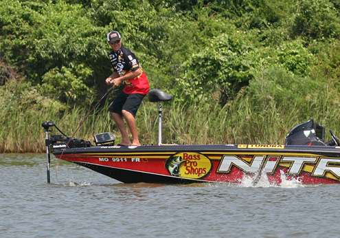 <p>
	The sizeable largemouth makes a jump near the boat as VanDam plays it carefully.</p>
