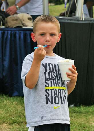 <p>
	 </p>
<p>
	Gage Naylor, 5, cools off with a rainbow snow cone.</p>
