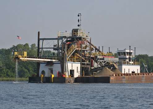<p>
	A barge was dredging up the back of the harbor early on Day Two of the Diamond Drive.</p>
