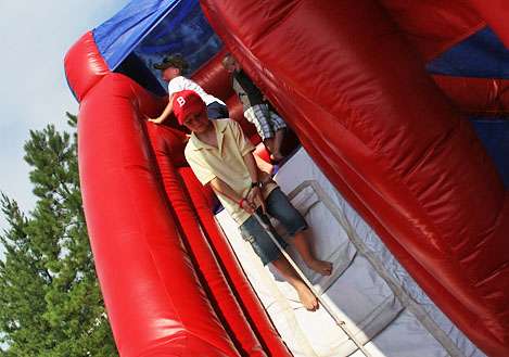 <p>
	 </p>
<p>
	Kids enjoy the free bounce house on site at the weigh-in.</p>
