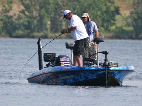 <p>
	Denny Brauer fights the bass towards the back of the boat.</p>
