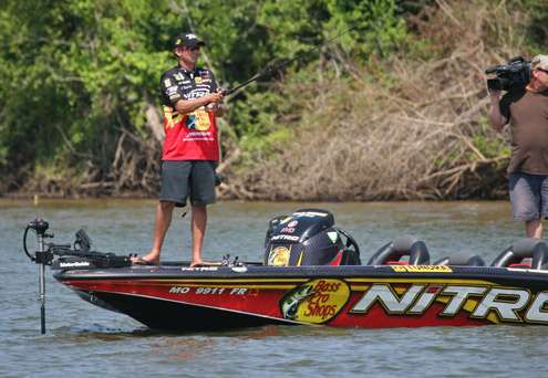 <p>
	Kevin VanDam casts to a spot that produced his biggest fish on Thursday.</p>

