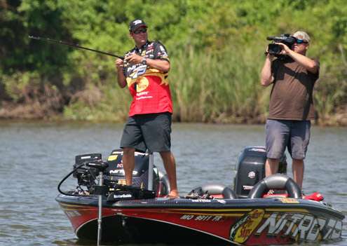 <p>
	On the very next cast, Kevin VanDam sets the hook on another bass.</p>
