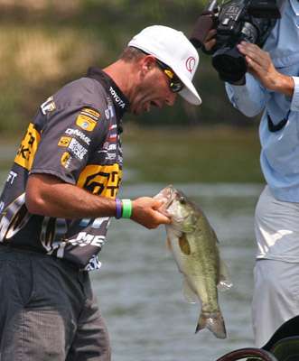 <p>
	Swindle gives a war cry for the cameras before taking the fish back to the livewell.</p>
