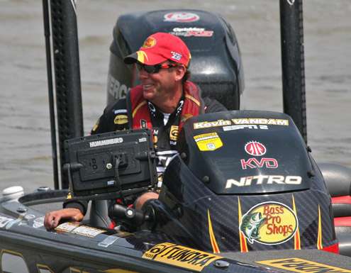<p>
	Kevin VanDam jokes with Denny Brauer about the close call as they both wait to trailer their boats.</p>
