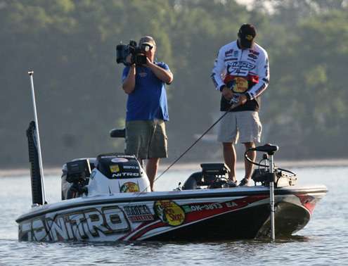 <p>
	After arriving at his first stop, Evers makes his first cast, while an ESPN camera films the action.</p>
