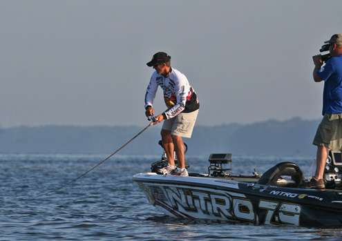 <p>
	Evers plays a good-sized largemouth to the boat.</p>
