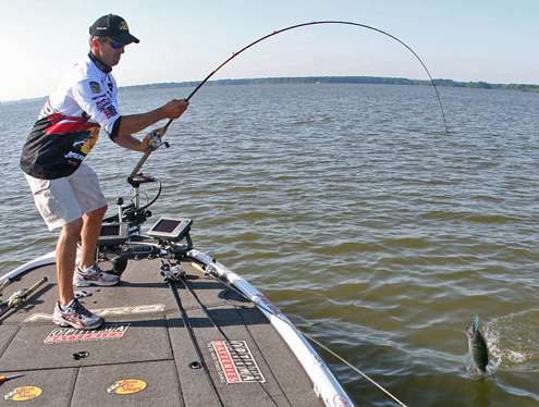 <p>
	Edwin Evers swings this nice largemouth into the boat on Wheeler Lake.</p>
