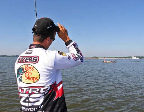 <p>
	Evers watches as Kelly Jordon fishes not too far away.</p>
