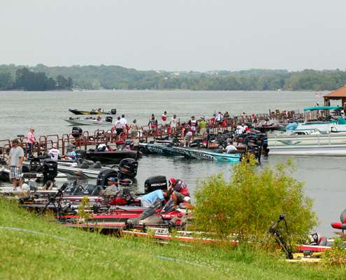 <p>
	Competitor boats line the area near The Point Marina as they come in for the Day One weigh in on Douglas Lake. </p>
