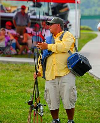 <p>
	Co-anglers gathered their gear before checking the Day Two pairing sheets. </p>
