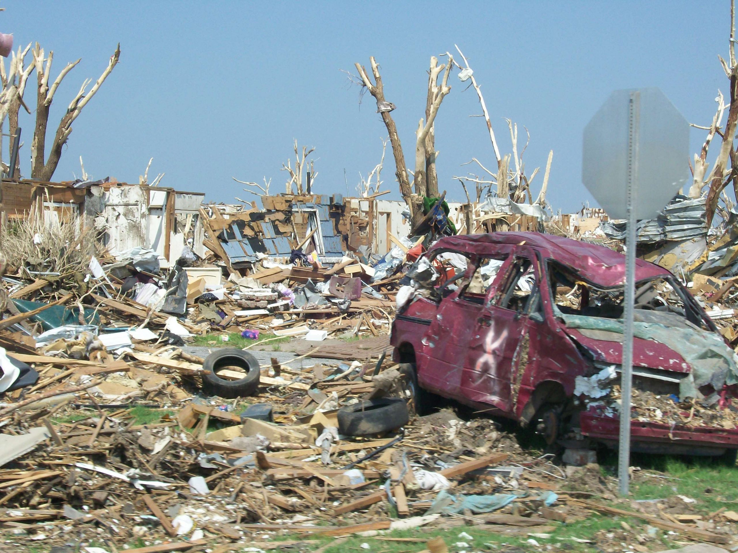 <p>
	Autos as well as homes were destroyed by the wind.</p>
