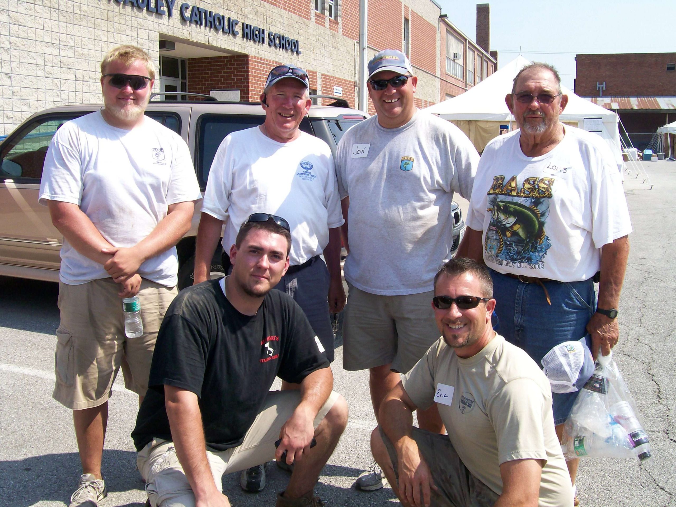 <p>
	Assisting in the cleanup effort were (Front row, from left) Volunteer coordinator Brandon Chamberlain and B.A.S.S. Federation Nation tournament staffers Eric Nichols and (back row) Brett Stewart, Mike Wall, Jon Stewart and Pee Wee Powers.</p>
