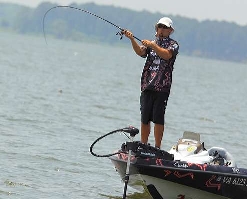 <p>
	 </p>
<p>
	John Crews wields a crankbait out in the main lake.</p>
