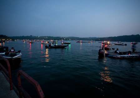 <p>
	The lake fills with boats in the early morning. </p>
