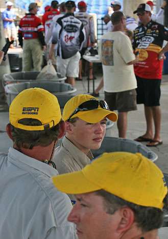 <p>
	 </p>
<p>
	Volunteers waiting for action wore yellow hats as they worked and got a closeup view of the Elites.</p>
