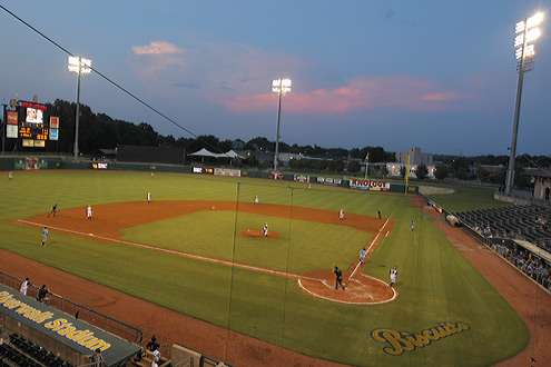 <p>
	As dusk arrives, the lights go on at the Biscuits' stadium in Montgomery.</p>
