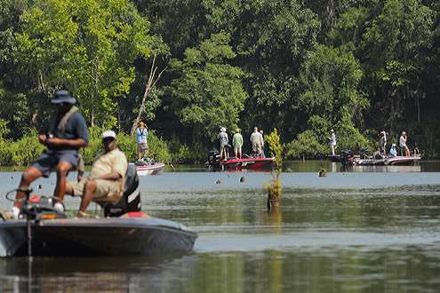 <p>
	 </p>
<p>
	A horde of boats fish and watch anglers fish on the Alabama River.</p>
