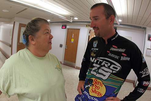 <p>
	 </p>
<p>
	Ott Defoe talks to a fishing fan at the VA Hospital.</p>
