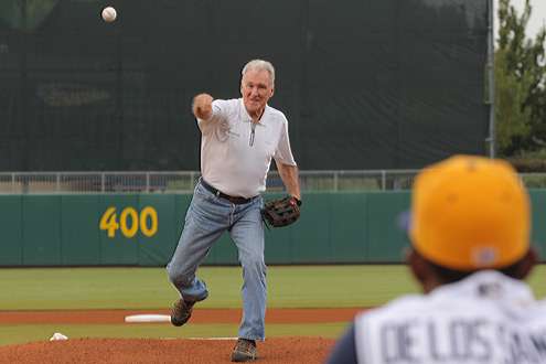 <p>
	Jerry McKinnis tosses the baseball home at the Montgomery Biscuits game on Wednesday night.</p>
