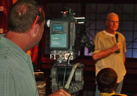 <p>
	 </p>
<p>
	B.A.S.S. owner Jerry McKinnis talks to the collegians as cameraman Brian Mason films for live streaming on the Internet.</p>
