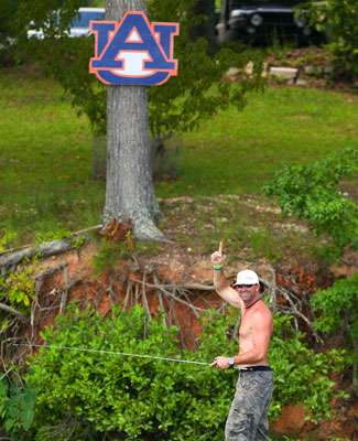 <p>
	... in front of an Auburn sign.</p>
