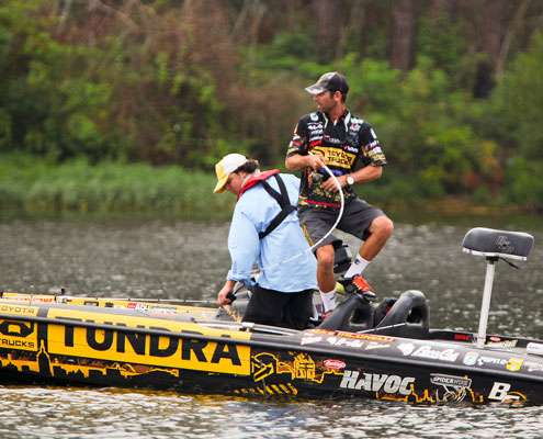 <p> 	Iaconelli runs to the back of the boat after hooking up. </p> 