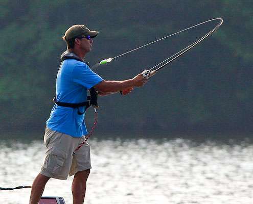 <p>
	The rod bows as Evers heaves a cast with a crankbait.</p>

