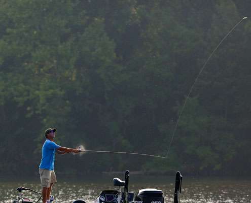 <p>
	Evers watches the trajectory of the lure while line rips from his reel.</p>
