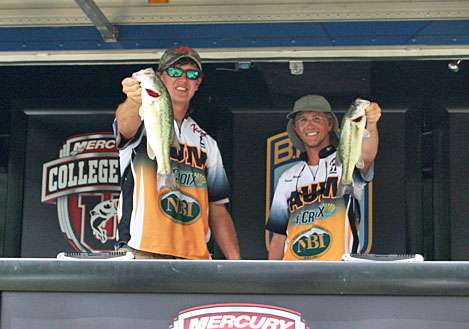 <p>
	Corey Pierce and Jacob Nummy of Auburn-Montgomery show off their 10<sup>th</sup>-place fish.</p>
