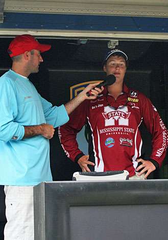 <p>
	Faulk, whose parents were on hand, talks about his catch, considered very healthy for Lake Maumelle.</p>

